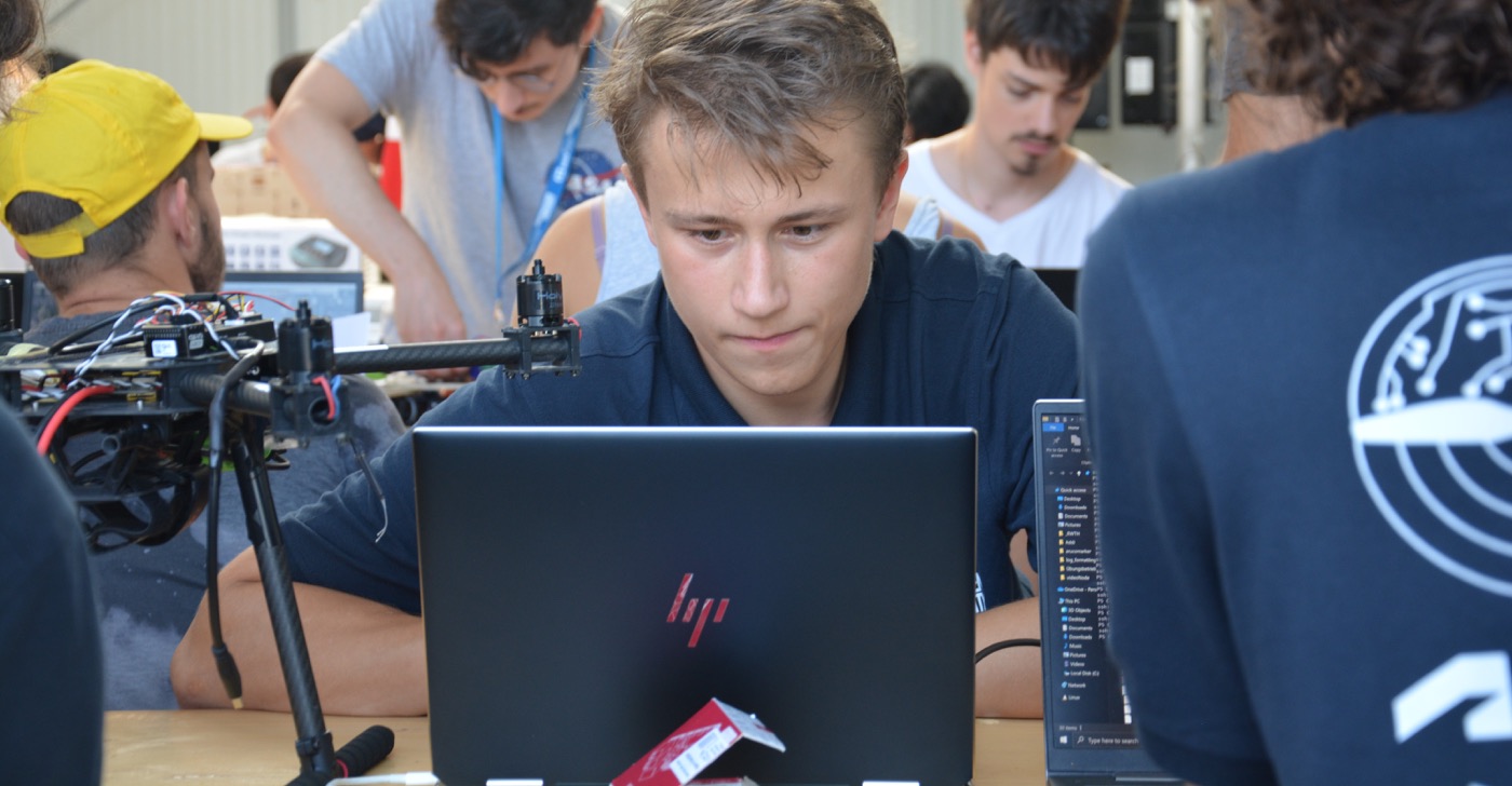 ADDI team members working together on a drone and its software